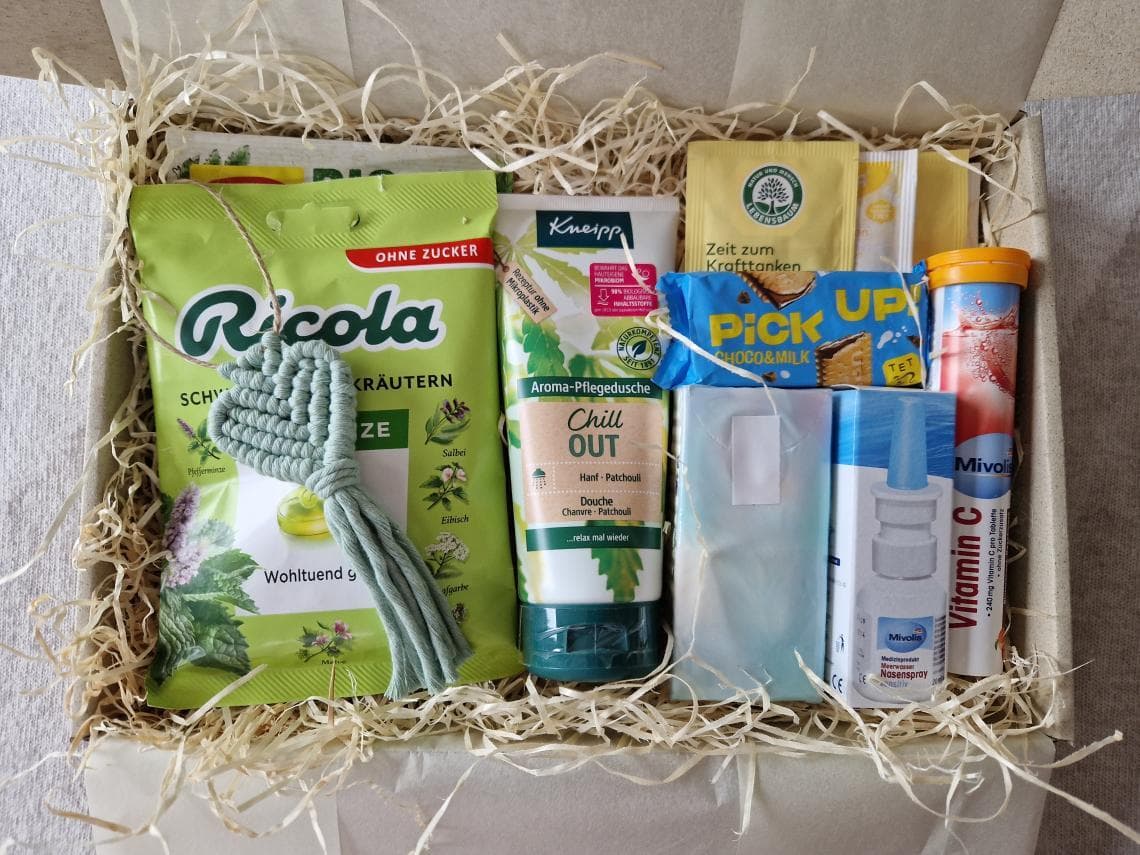 Gesundheitsbox bei Erkältung mit Tee, Pflege und Gute-Besserung-Produkten